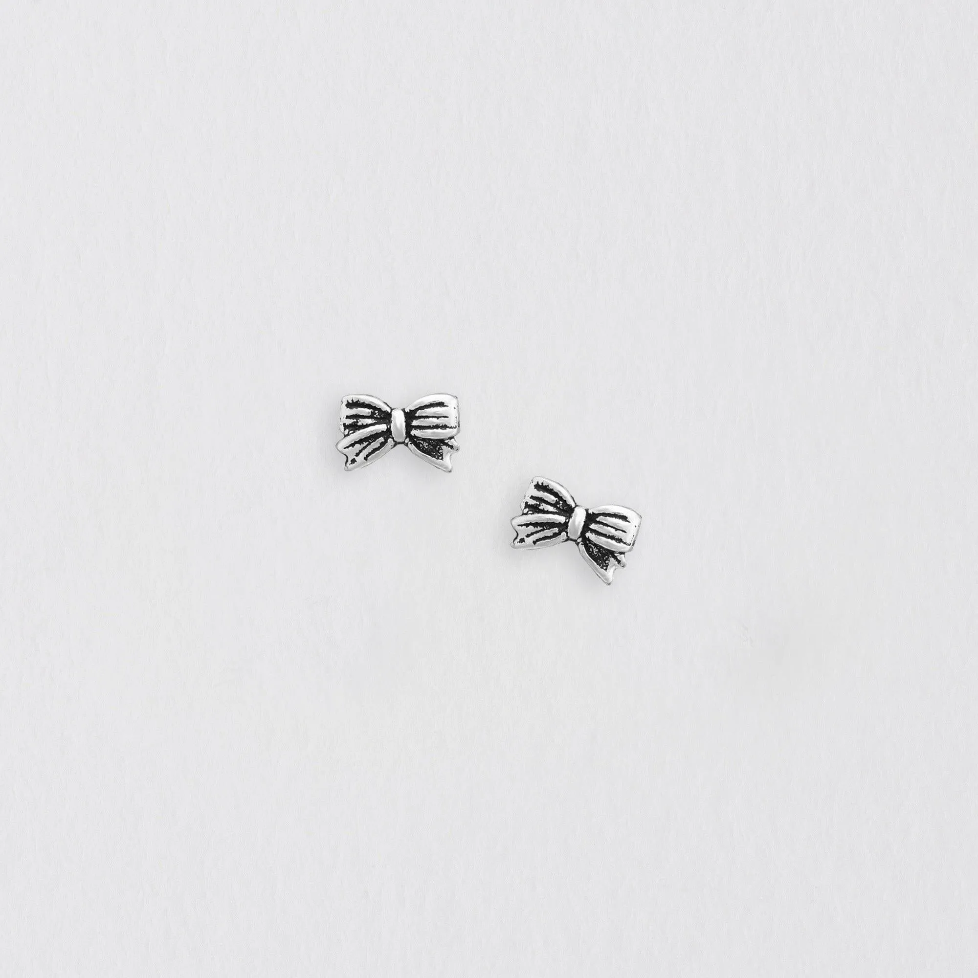 Silver Bow Earrings - Stylish Studs for a Timeless Look