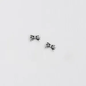 Silver Bow Earrings - Stylish Studs for a Timeless Look