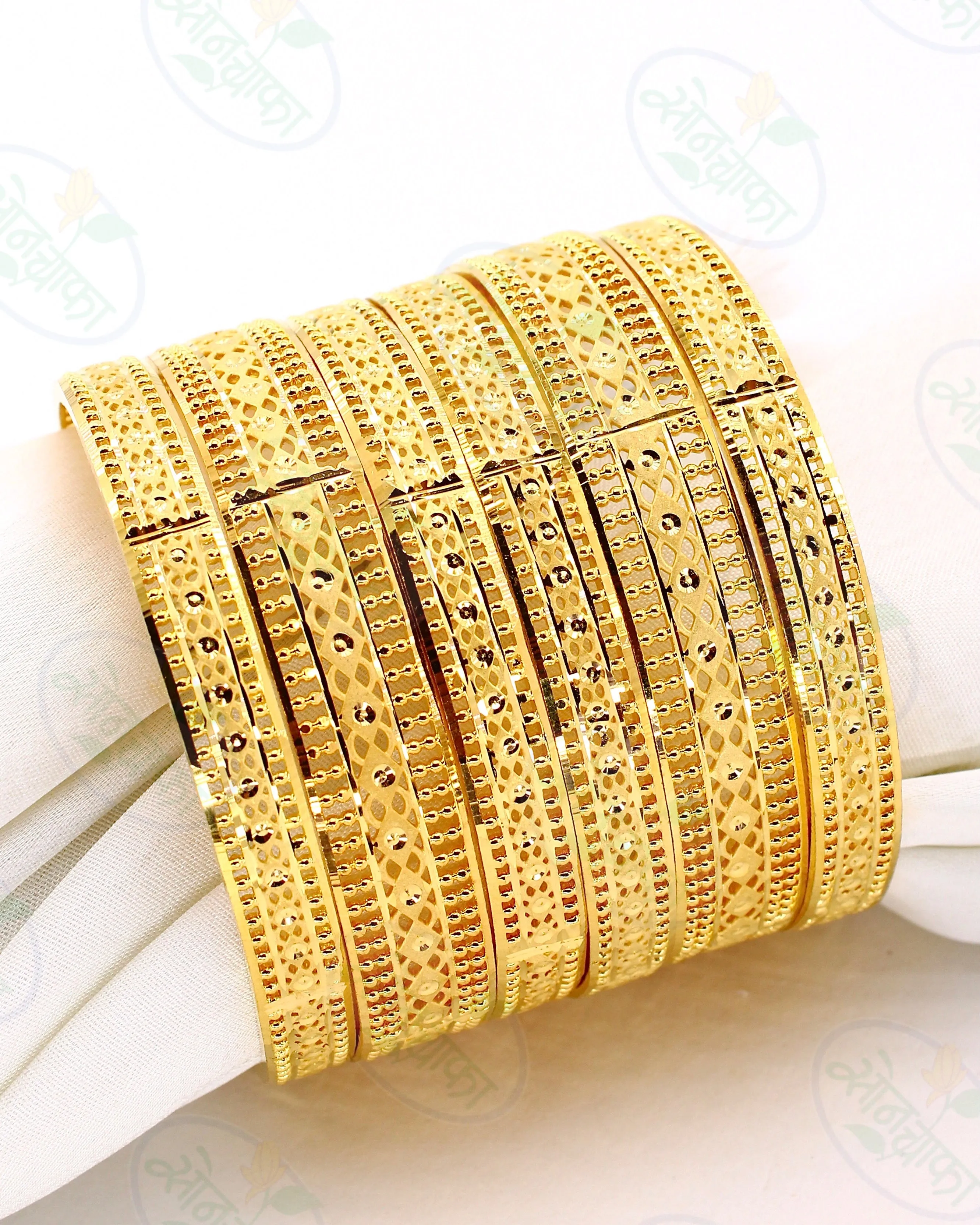 UNIQUELY DESIGNED GOLD PLATED BANGLES